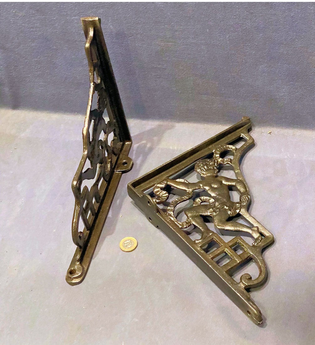 Pair of Figural Cast Iron Wall Brackets — view 2