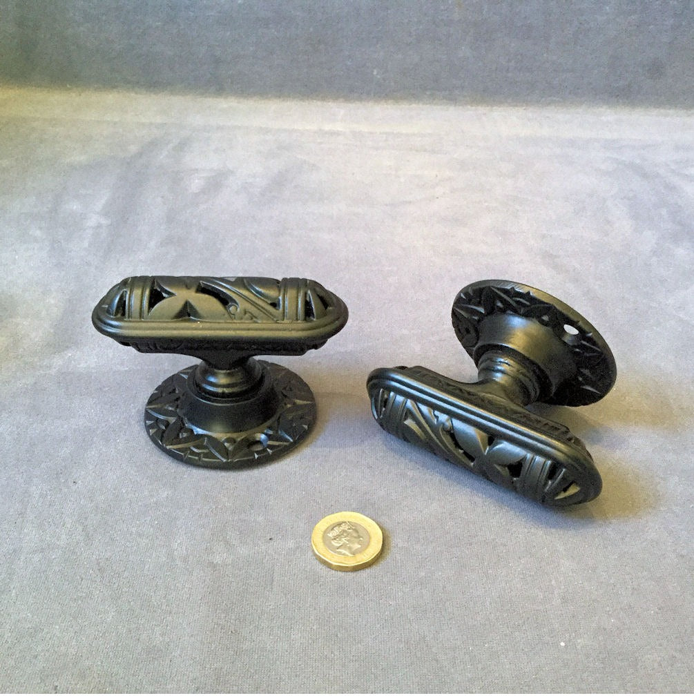 Pair of Kenrick Cast Iron Door Handles — Cast iron, late 19th century