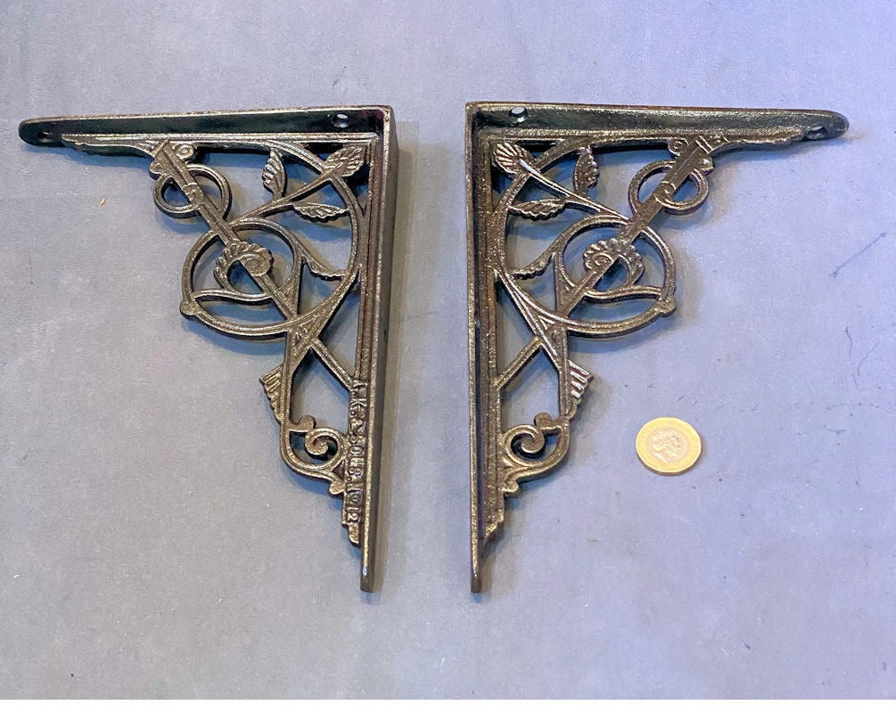 Pair of Kenrick Cast Iron Shelf Brackets — Cast iron, late 19th century