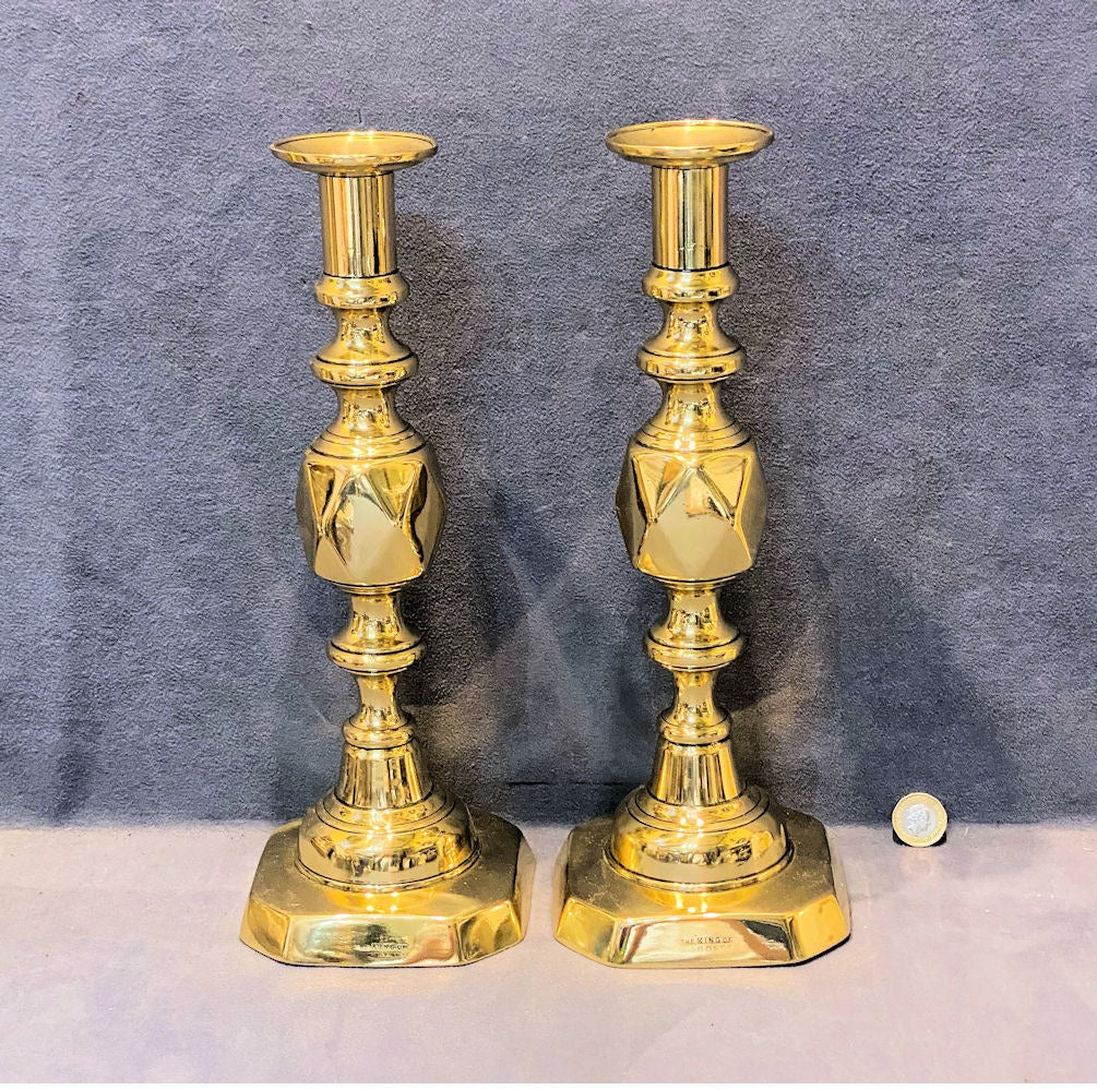 Pair of King of Diamonds Brass Candlesticks — Brass, late 19th century