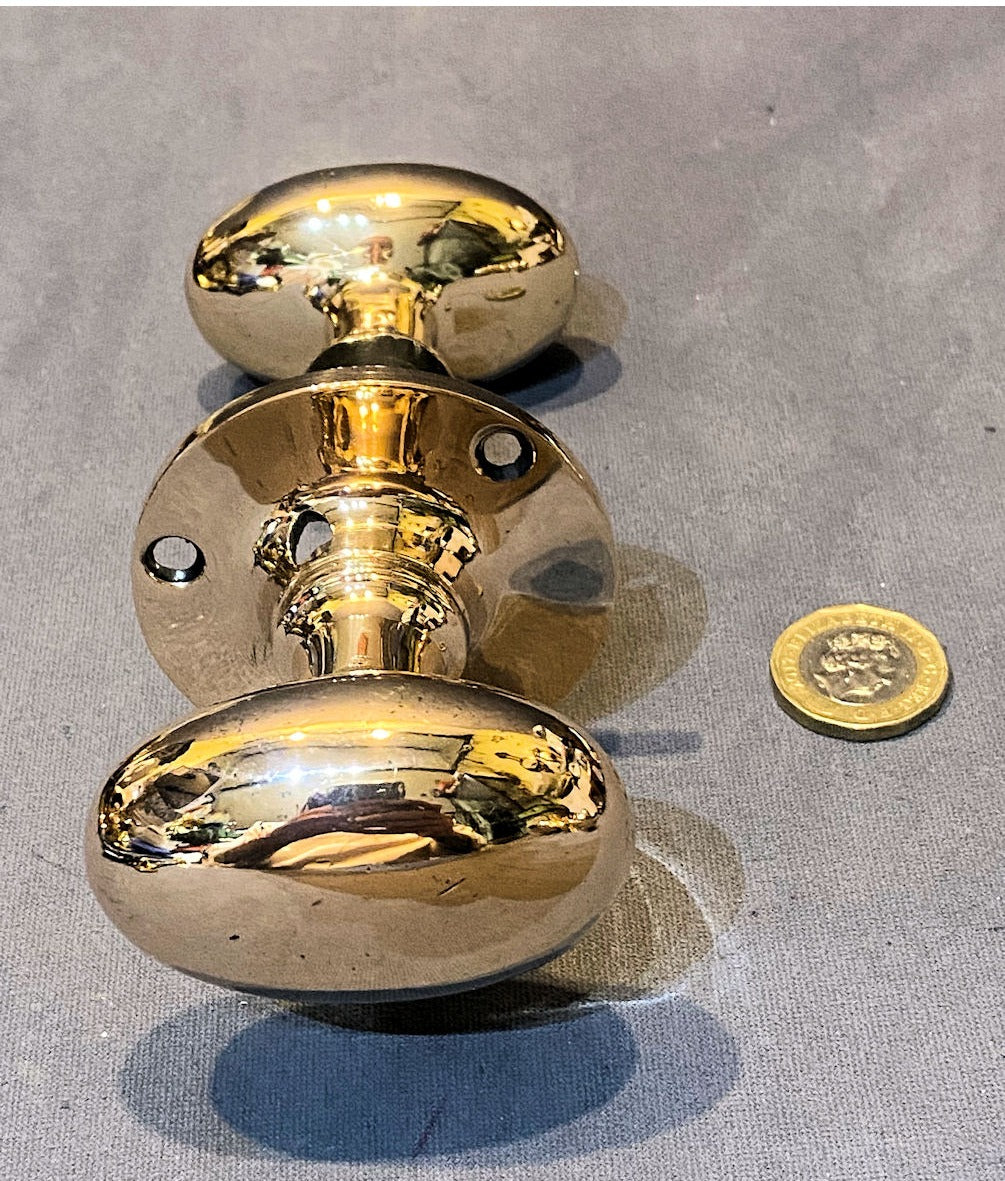 Pair of Oval Brass Door Handles — view 2