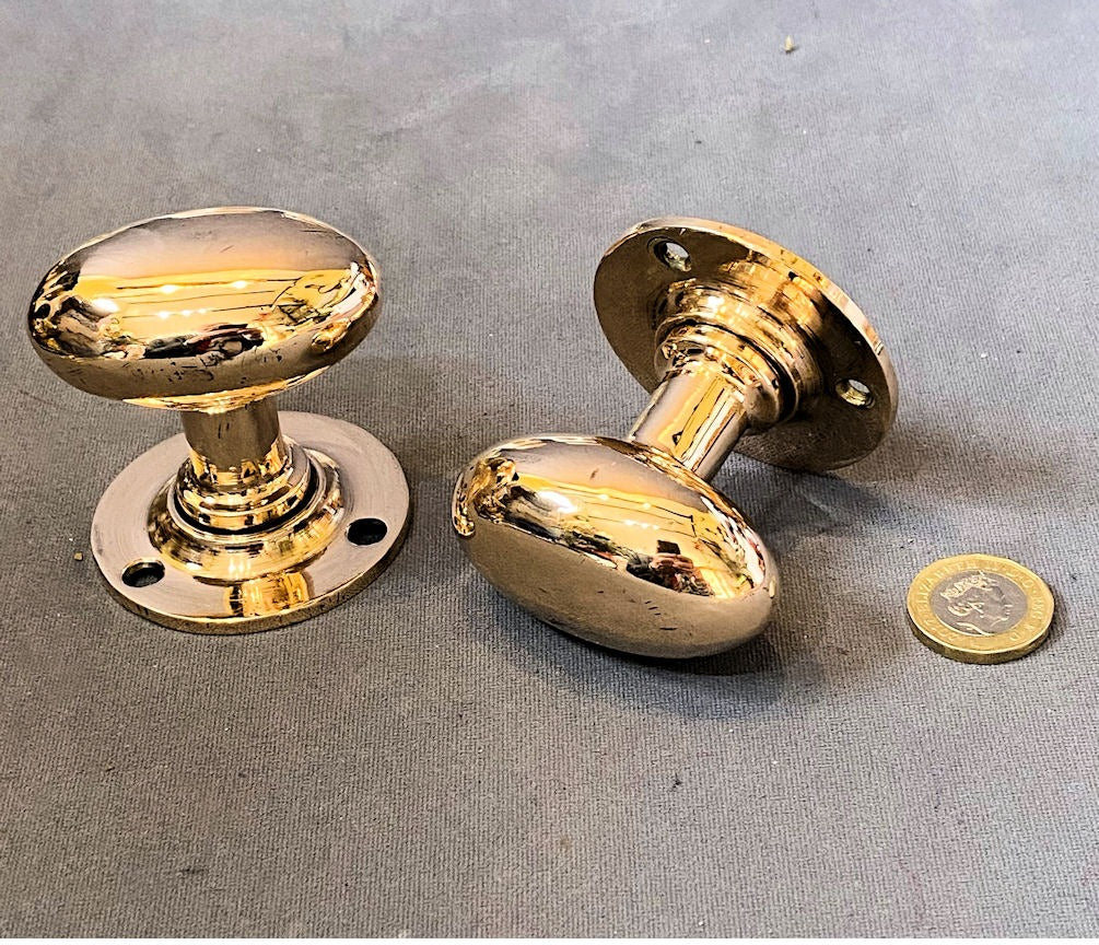 Pair of Oval Brass Door Handles — Brass, 1920's