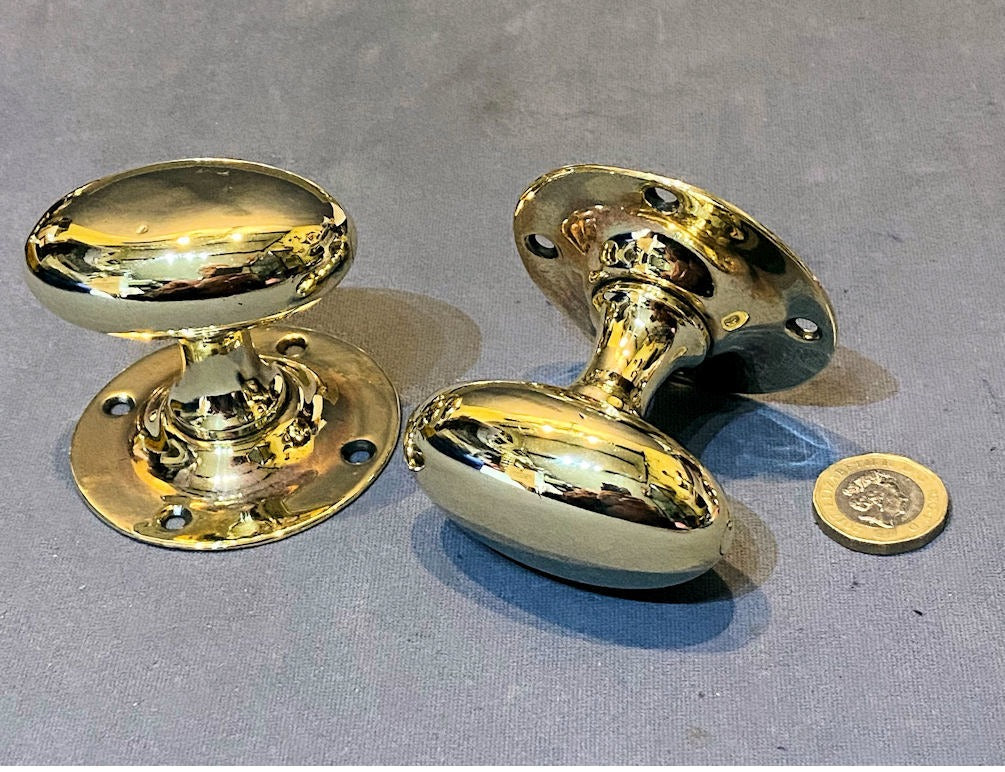 Pair of Oval Brass Door Handles — Brass, 1920's
