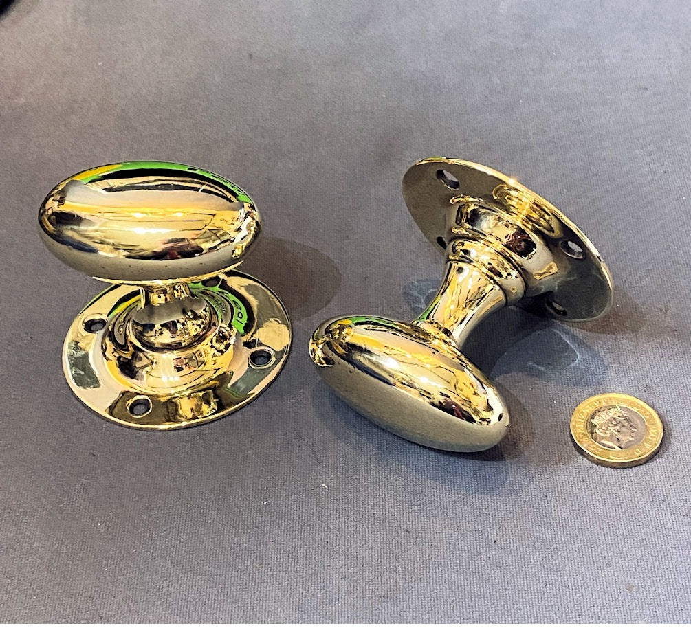 Pair of Oval Brass Door Handles — Brass, 1920's
