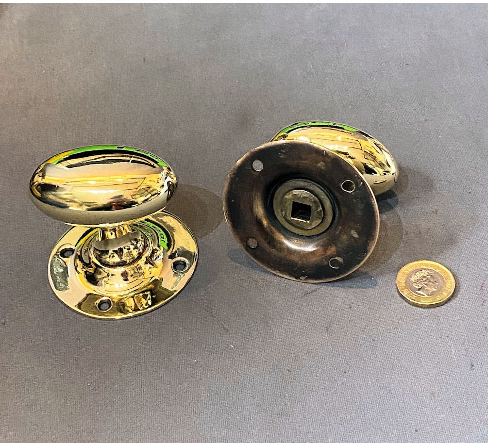 Pair of Oval Brass Door Handles — view 2