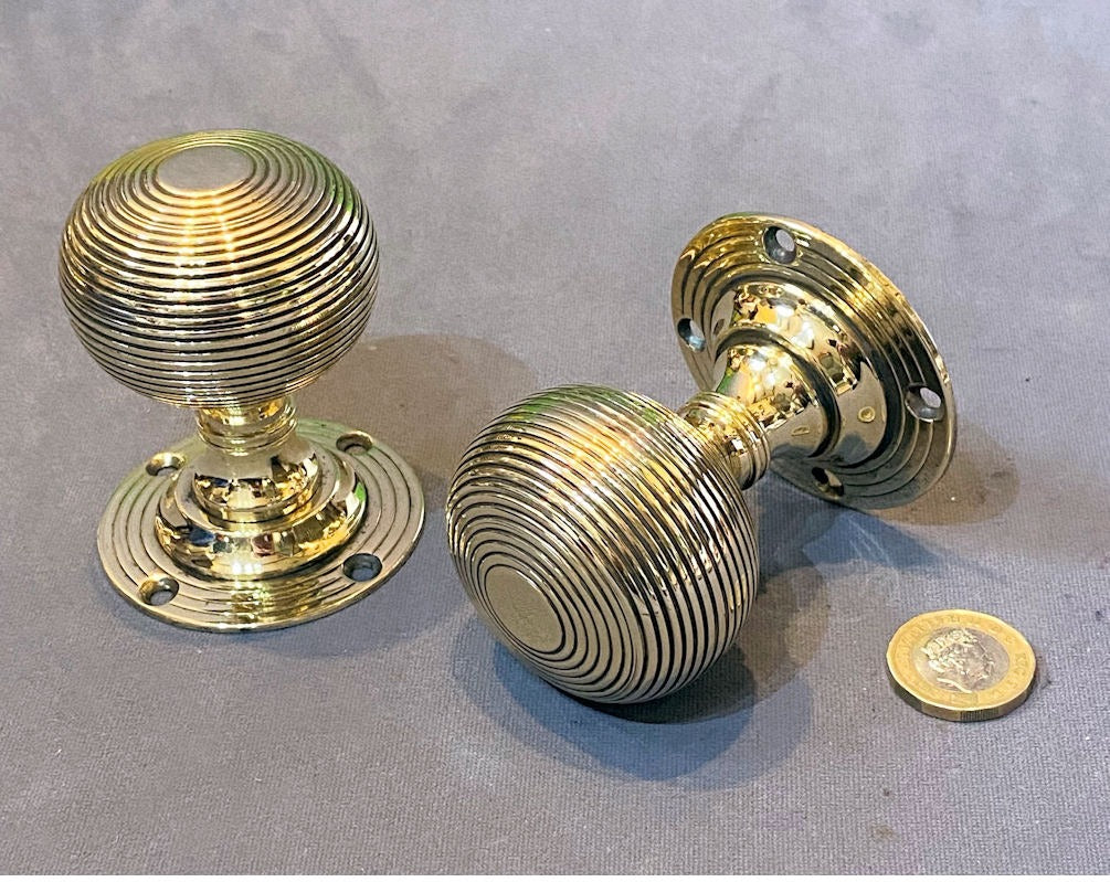 Pair of Ribbed Brass Door Handles — Brass, late 19th century