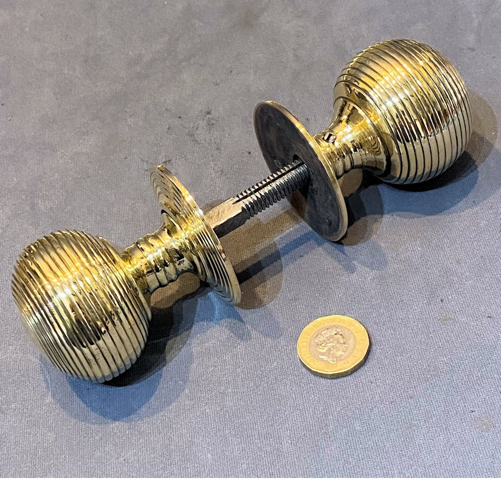 Pair of Ribbed Brass Door Handles — Brass, 19th century