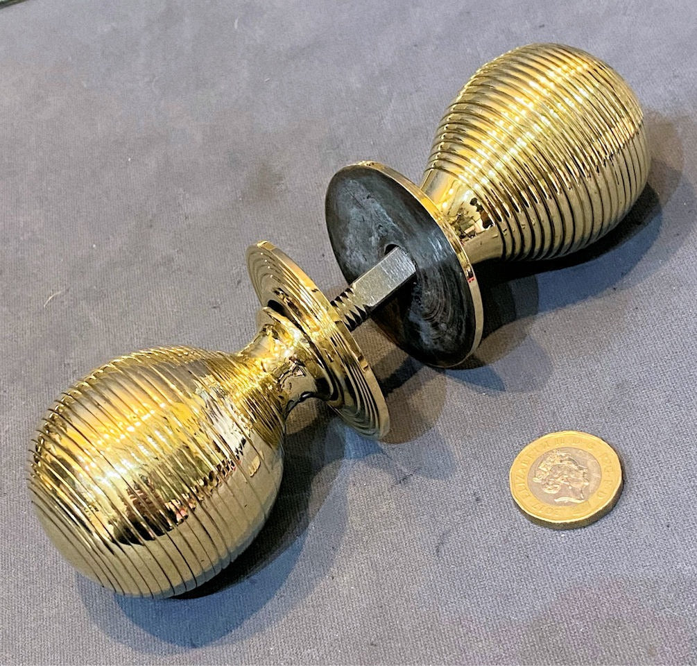 Pair of Ribbed Brass Door Handles — Brass, late 19th century