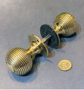 Pair of Ribbed Brass Door Handles — Brass, late 19th century