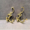 Pair of Triple Brass Hat and Coat Hooks — Brass, late 19th century