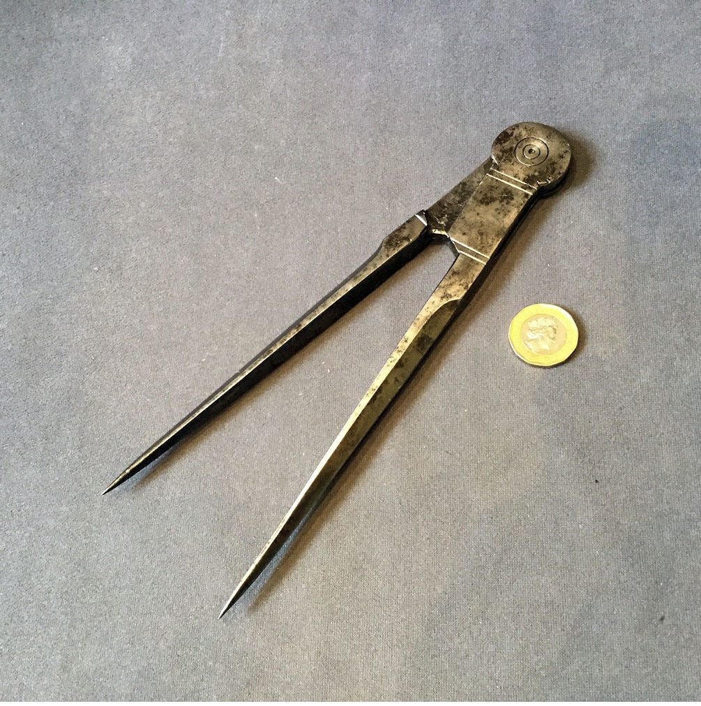 Pair of Wrought Iron Callipers — Wrought iron, late 19th century