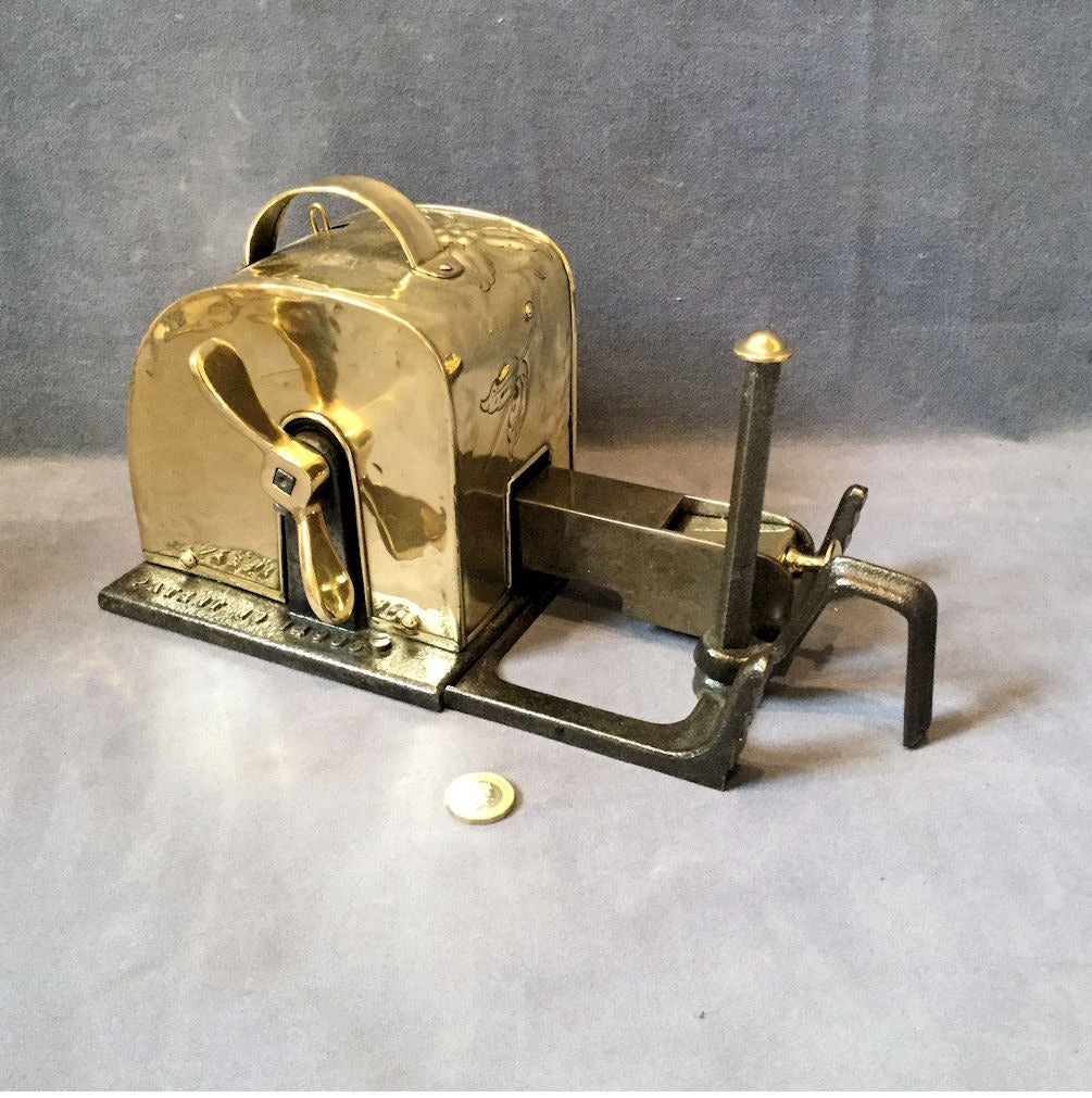 Queen Fire Lighting Fan — Brass, late 19th century