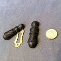 Ribbed Ebony Keyhole Cover, 2 available — Brass, late 19th century
