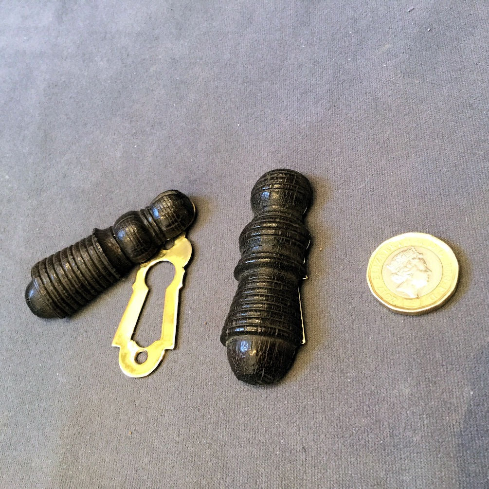 Ribbed Ebony Keyhole Cover, 2 available — Brass, late 19th century
