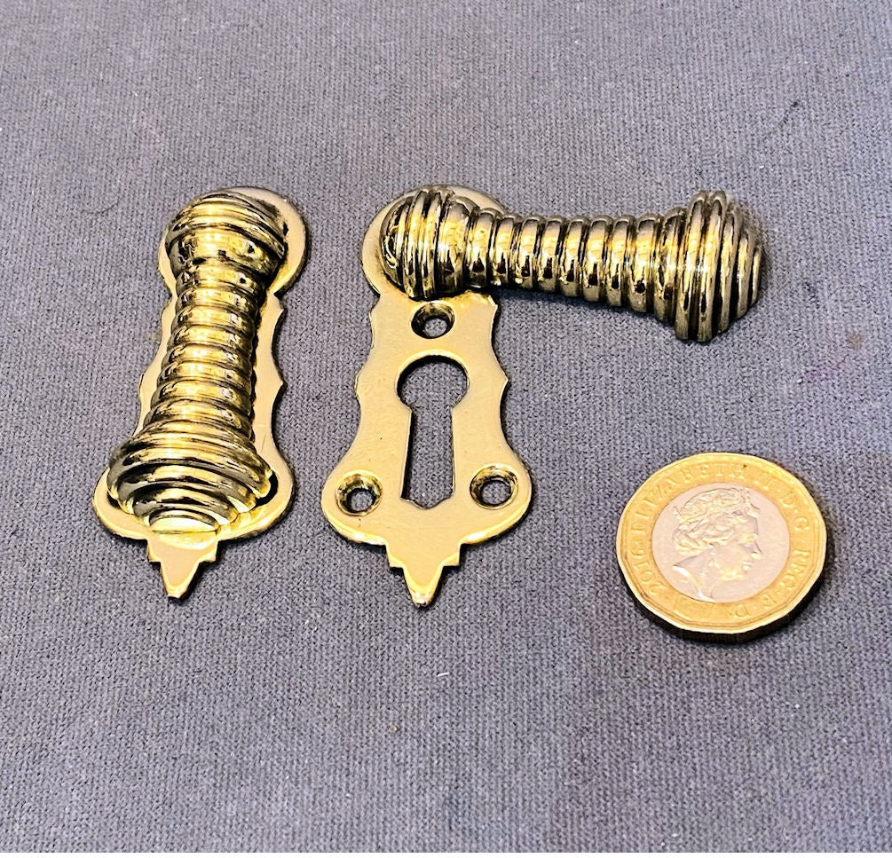 Run of Ribbed Brass Keyholes with Covers, 14 matching available — Brass, circa 1900