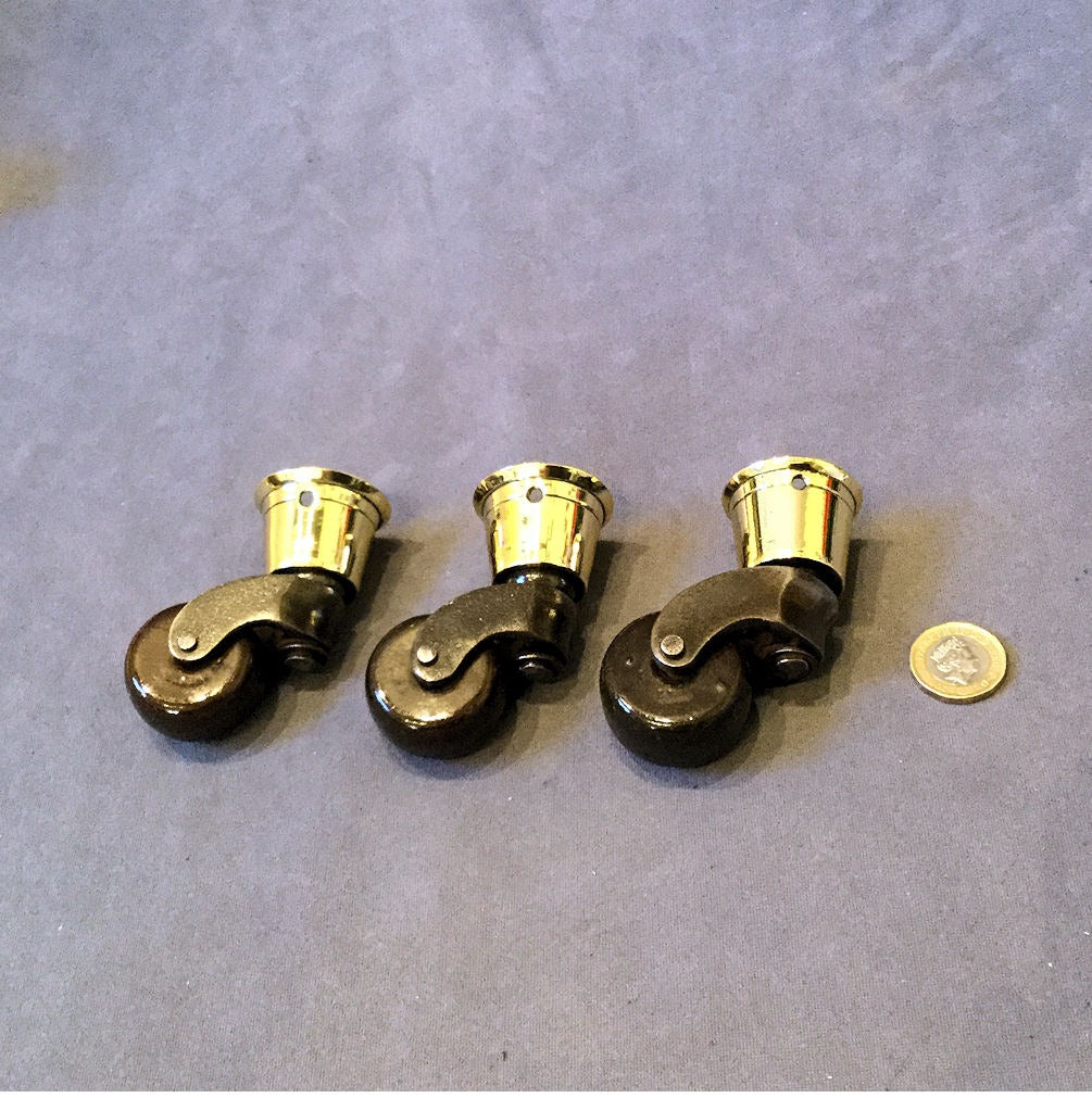Set of 3 Brass and Ceramic Furniture Castors — Brass, late 19th century
