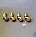 Set of 4 Brass and Ceramic Castors — Brass, late 19th century