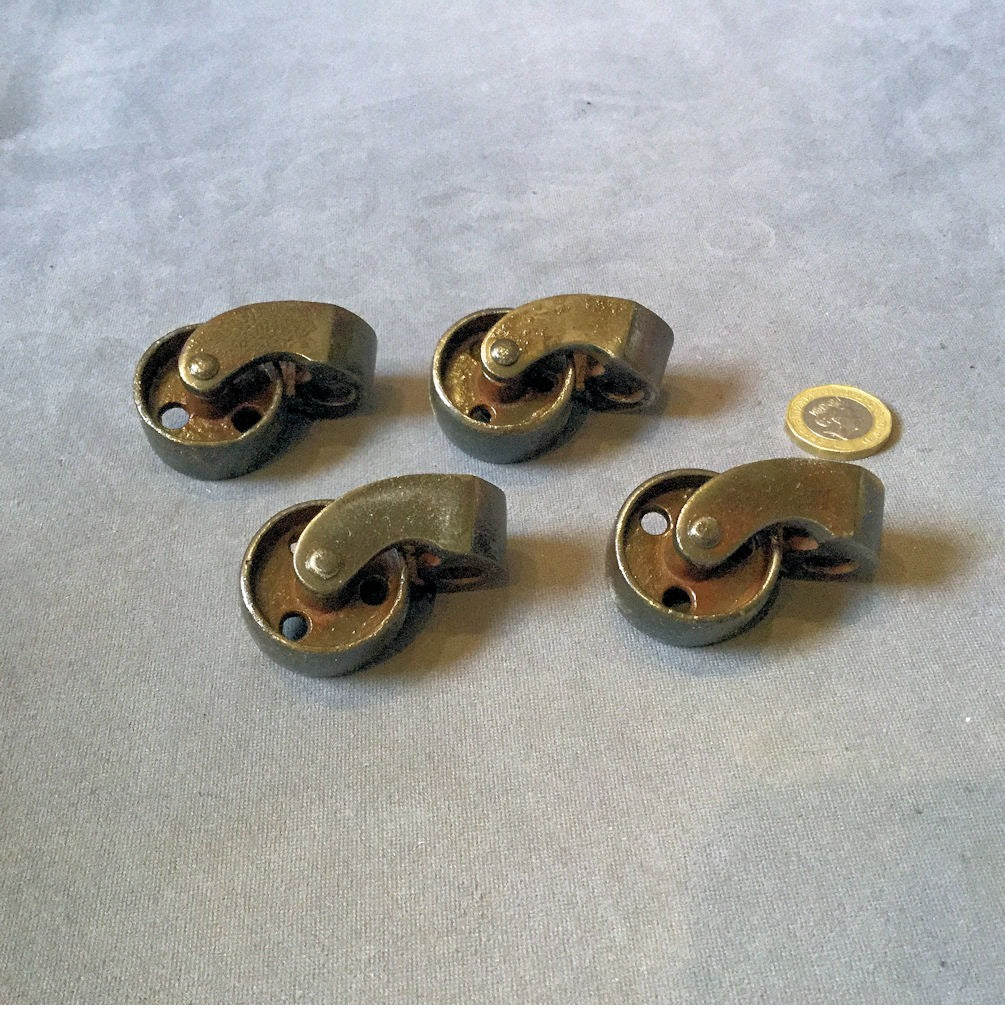 Set of 4 Castors For a Childs Bed or Cot — Iron, late 19th century
