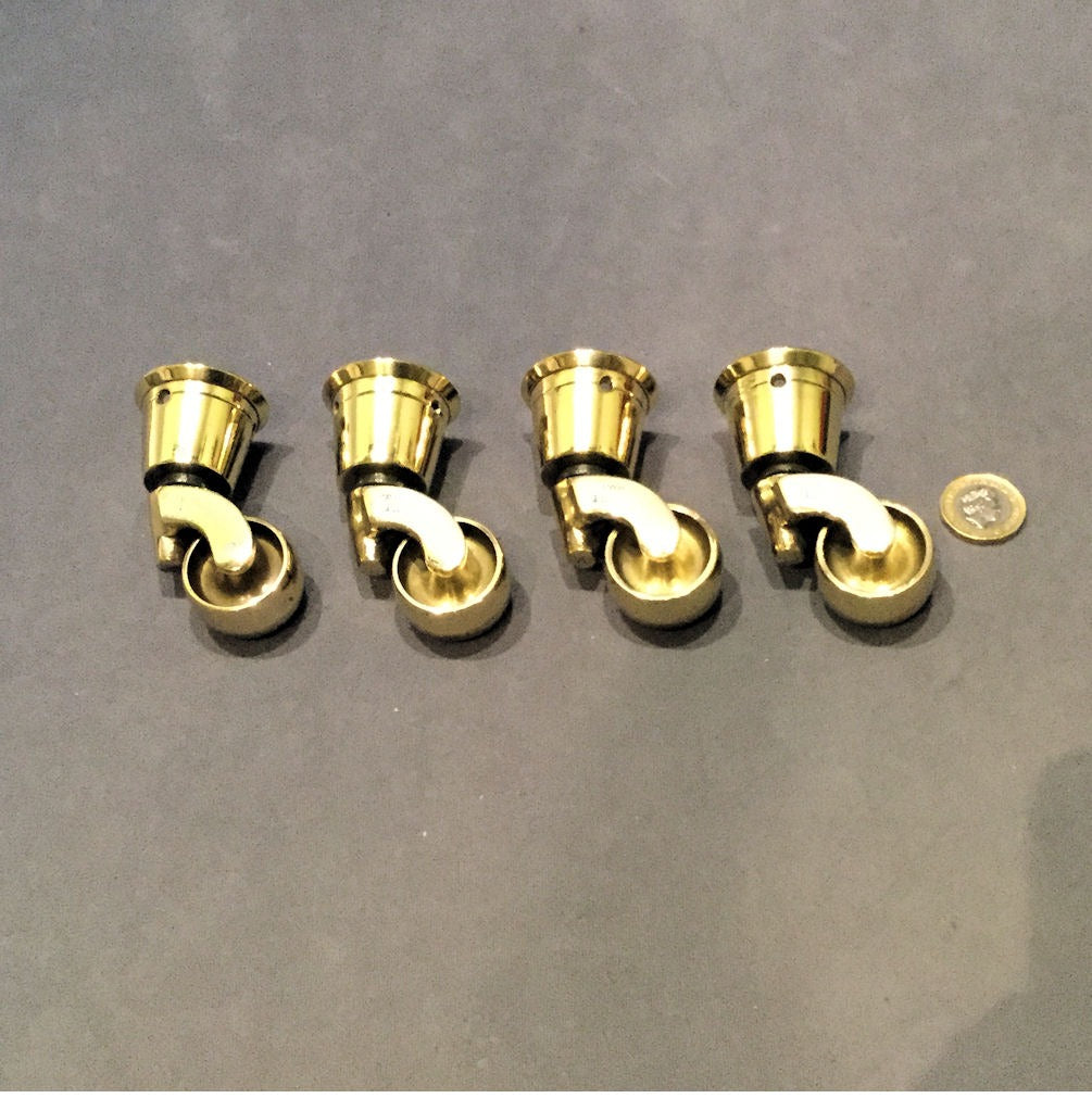 Set of 4 Unused Brass Furniture Castors, 4 sets available — Brass, 1906