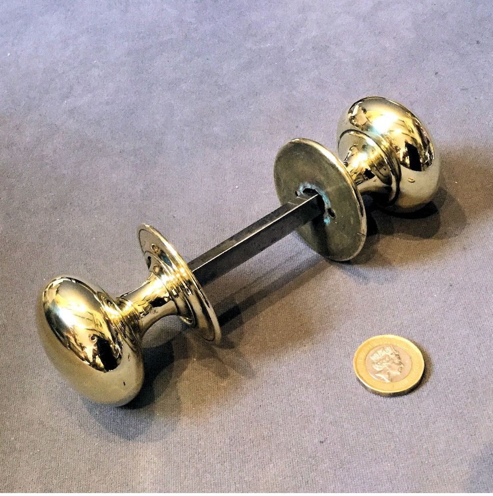 Several Pairs of Brass Door Handles — Brass, early 19th century