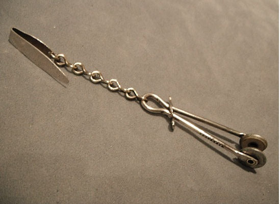 Skirt Lifter — Nickel, 1920's