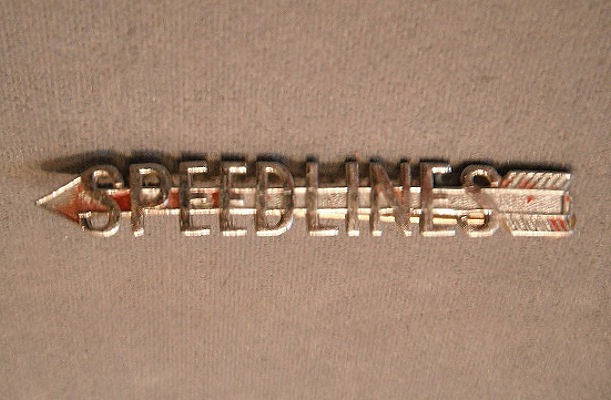 Speedlines Bus Badge — Chrome
