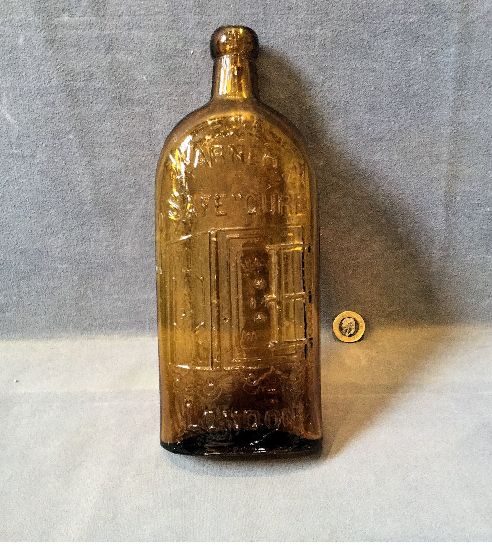 Warners Safe Cure Bottle — Glass, 1920's