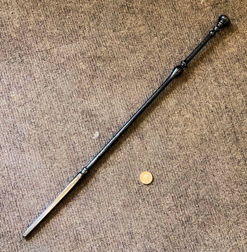 Wrought Iron Fireside Poker — Wrought iron, late 19th century