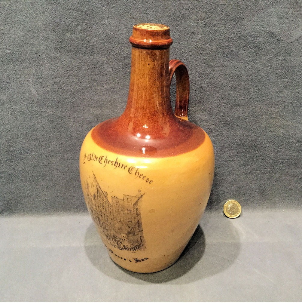 Ye Olde Cheshire Cheese Whiskey Jug — Stoneware, late 19th century